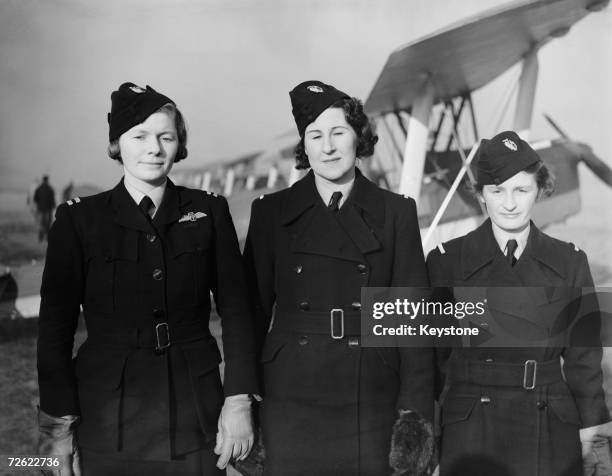 Pauline Gower, Winifred Crossley and Margaret Cunnison at an aerodrome near London, 10th January 1940. They are among the first women pilots to fly...