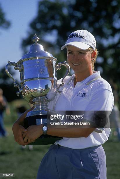 Karrie Webb holds up her trophy after the U.S. Women's Open at the Merit Club in Libertyville, Illinois.Mandatory Credit: Stephen Dunn /Allsport