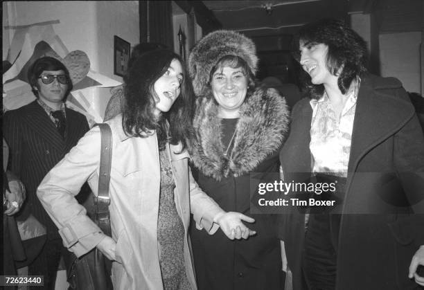 American politician, social & political activist, and feminist icon Bella Abzug shares a laugh with her two daughters, law student Liz and sculptor...