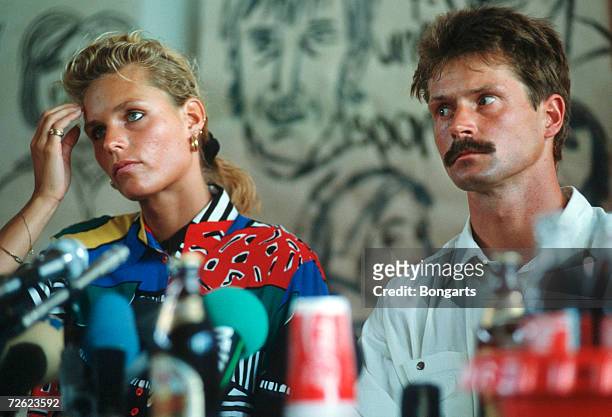 Katrin Krabbe and Coach Thomas Springstein are seen during the press conference on June 13, 1992 in Neubrandenburg, Germany.
