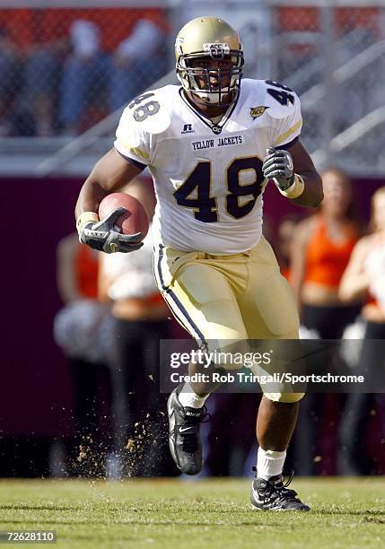 Running Back Michael Matthews of the Georgia Tech Yellow Jackets rushes against the Virgina Tech Hokies on September 30, 2006 at Lane Stadium in...