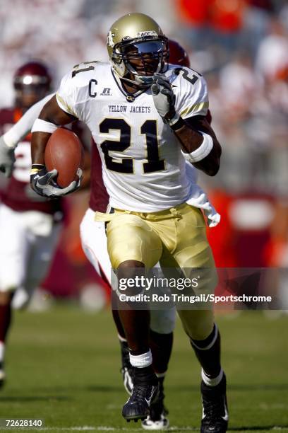 Wide Receiver Calvin Johnson of the Georgia Tech Yellow Jackets runs with the ball against the Virgina Tech Hokies on September 30, 2006 at Lane...