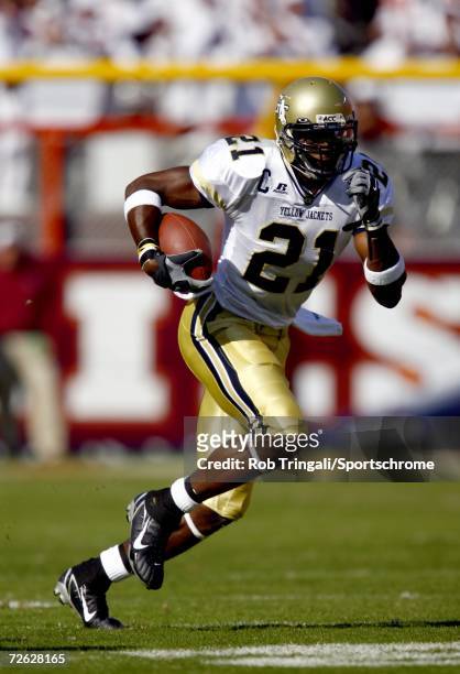 Wide Receiver Calvin Johnson of the Georgia Tech Yellow Jackets runs with the ball against the Virgina Tech Hokies on September 30, 2006 at Lane...