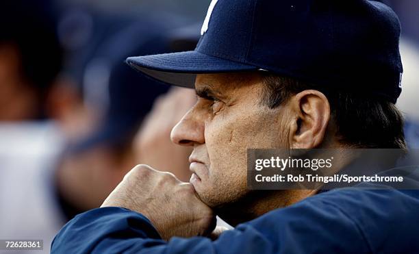 Manager Joe Torre of the New York Yankees sits in the dugout in a game against the Detroit Tigers during Game Four of the 2006 American League...