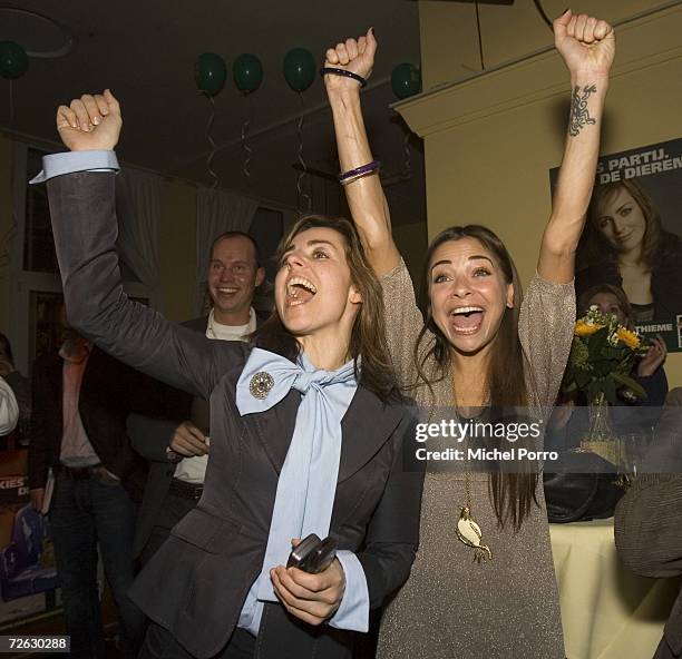 Party for the Animals leader Marianne Thieme and Dutch television personality Georgina Verbaan celebrate the exit poll results in an historic Dutch...