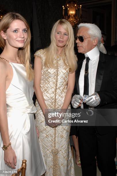 Actress Mischa Barton, model Claudia Schiffer and designer Karl Lagerfeld attend the Marie Clare Awards French Embassy November 22, 2006 in Madrid,...
