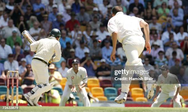 The first ball of the series bowled by Steven Harmison of England to Justin Langer of Australia heads towards Andrew Flintoff of England at second...