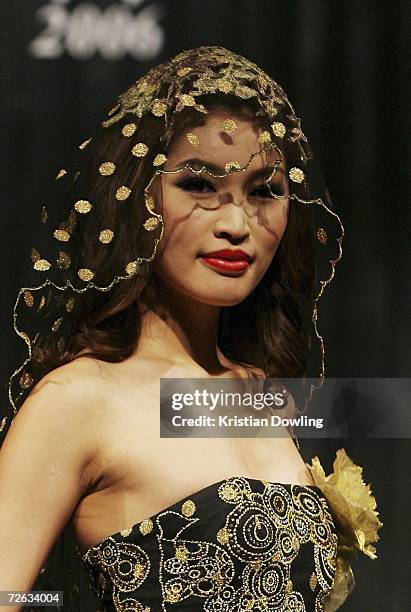 Model Amber Chia wears an outfit on the catwalk by designer Albert King on the first day of Malaysian-International Fashion Week at the Kuala Lumpur...