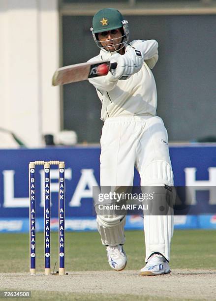 Pakistani cricketer Abdul Razzaq plays a shot during the fifth and last day of the second cricket Test match between Pakistan and West Indies at The...