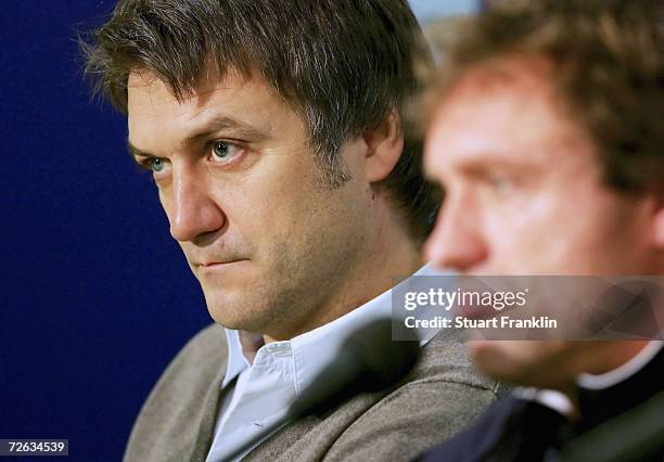 Dietmar Beiersdorfer, Sports Chief of HSV , and Thomas Doll, Trainer of Hamburger SV, attend a press conference after the training session of...