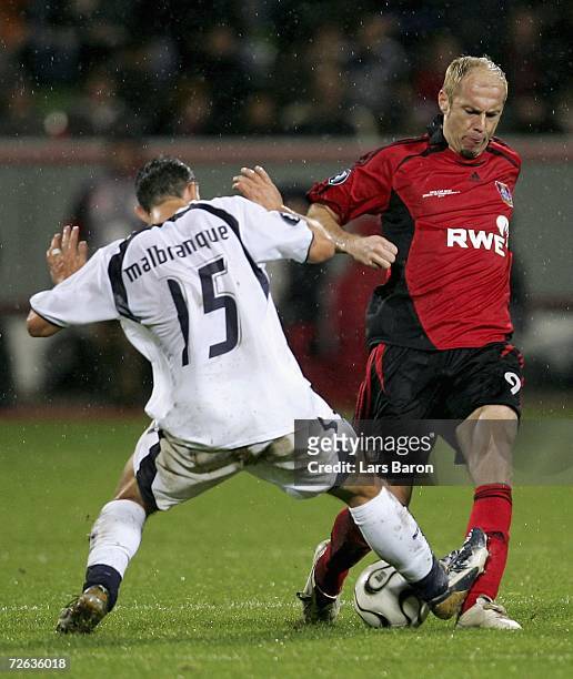Steed Malbranque of Tottenham challenges Sergej Barbarez of Leverkusen during the UEFA Cup Group B match between Bayer Leverkusen and Tottenham...