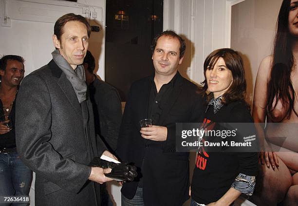 Photographers Nick Knight, Robin Derrick and fashion designer Bella Freud attend private view of 'Robin Derrick: Nudes' exhibition by Vogue's...