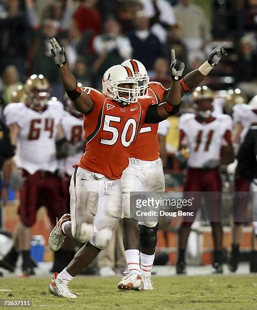 Linebacker Darryl Sharpton of the University of Miami Hurricanes celebrates a drive ending interception in the fourth quarter by the Boston College...
