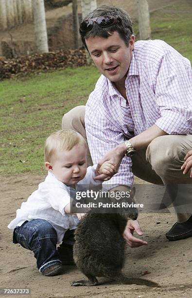 Crown Prince Frederik & his son Crown Prince Christian of Denmark pose with a small kangaroo at a photo call held at Bonorong Park Wildlife Centre at...