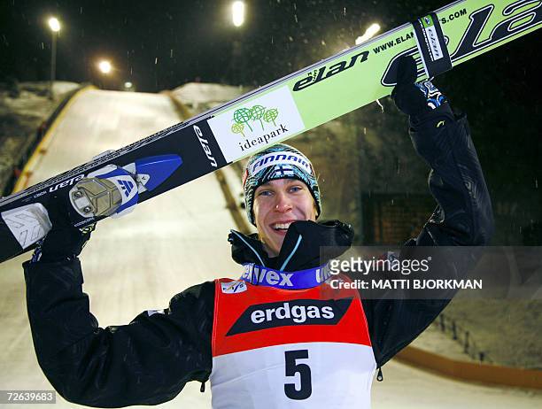 Finland's Arttu Lappi celebrates after winning the season's first Ski jumping World Cup event in Ruka, Kuusamo, 24 November 2006. The competition was...