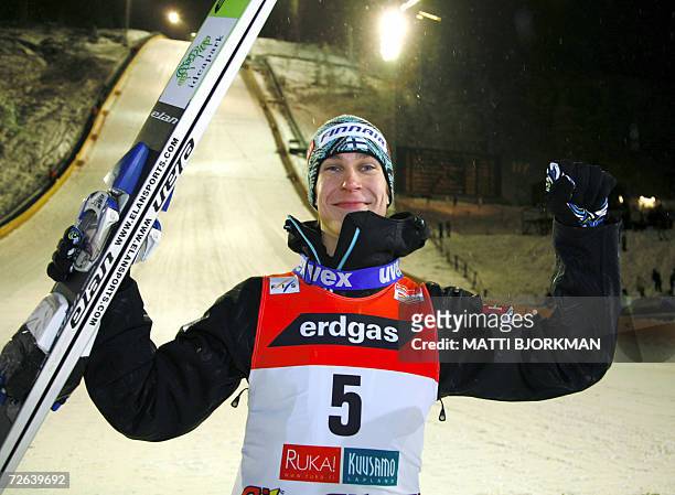 Finland's Arttu Lappi celebrates after winning the season's first Ski jumping World Cup event in Ruka, Kuusamo, 24 November 2006. The competition was...