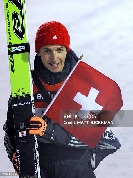Switzerland's Simon Ammann poses after placing second in the season's first Ski jumping World Cup event in Ruka, Kuusamo, 24 November 2006. The...