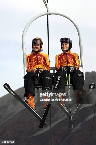 Christina Lustenberger and Brigitte Acton of Canada take the lift up the hill for a look at the course during practice 24 November 2006 in Aspen,...