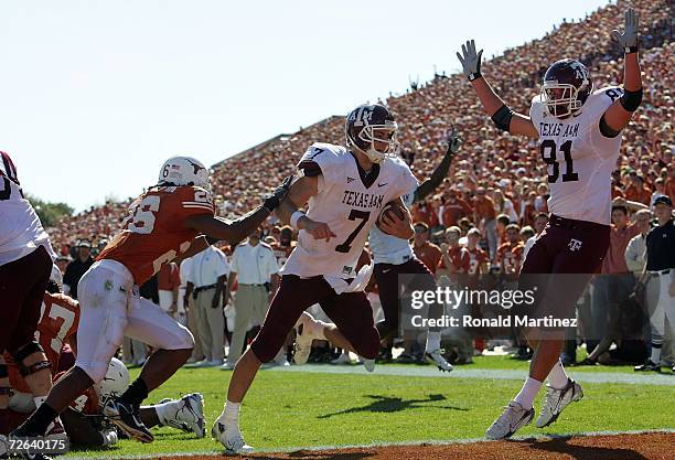 Quarterback Stephen McGee of the Texas A&M Aggies runs for a touchdown against the Texas Longhorns at Darrell K Royal-Texas Memorial Stadium November...