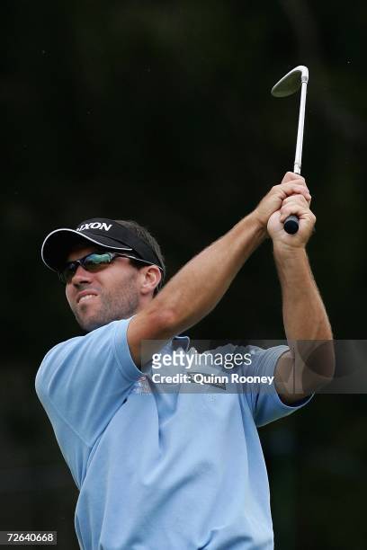 Andrew Tschudin of Australia plays his approach shot during the third round of the 2006 Mastercard Masters at Huntingdale Golf Club on November 25,...