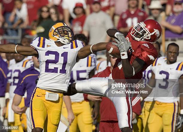 Chevis Jackson of the LSU Tigers deflects a pass to Damian Williams of the Arkansas Razorbacks at War Memorial Stadium on November 24, 2006 in Little...