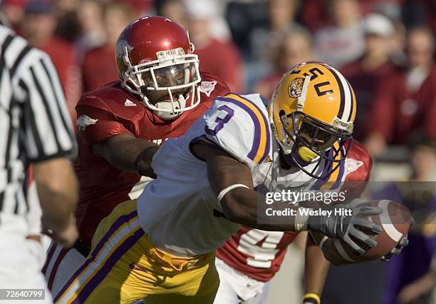 Craig Davis of the LSU Tigers leaps and stretches for the football over the goal line for a touchdown against the Arkansas Razorbacks at War Memorial...