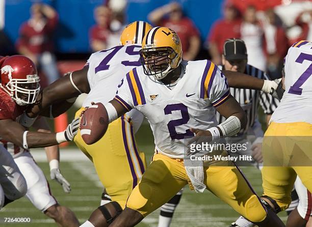 JaMarcus Russell of the LSU Tigers pitches the ball to the running back against the Arkansas Razorbacks at War Memorial Stadium on November 24, 2006...