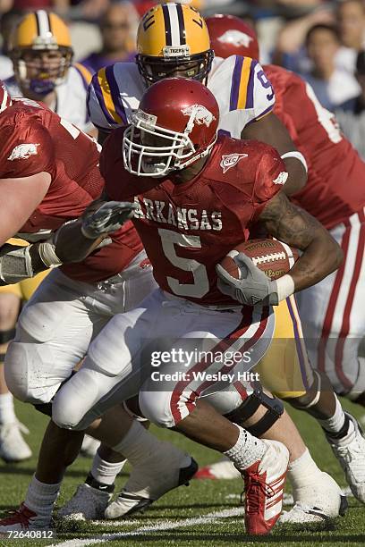 Darren McFadden of the Arkansas Razorbacks rushes with the ball against the LSU Tigers at War Memorial Stadium on November 24, 2006 in Little Rock,...
