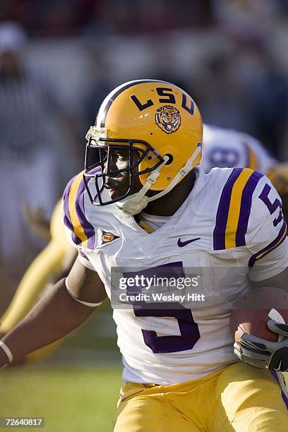 Keiland Williams of the LSU Tigers runs with the ball against the Arkansas Razorbacks at War Memorial Stadium on November 24, 2006 in Little Rock,...