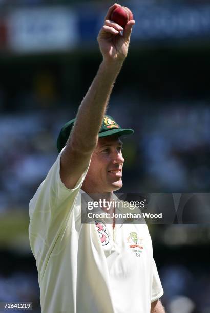 Glenn McGrath of Australia celebrates taking five wickets in England's first innings during day three of the first Ashes Test Match between Australia...
