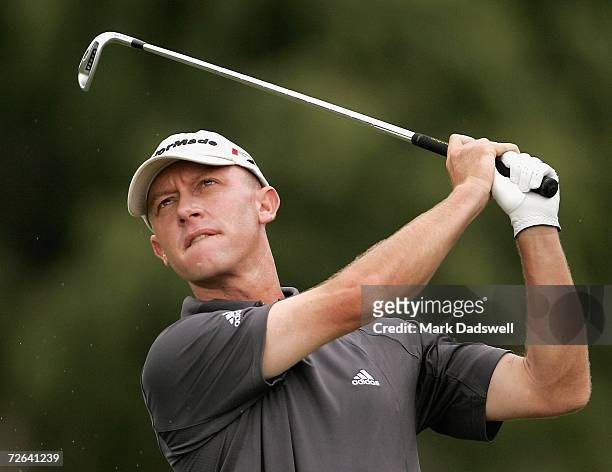 Nathan Green of Australia hits an approach shot on the eleventh hole during round three of the 2006 Mastercard Masters at Huntingdale Golf Club...