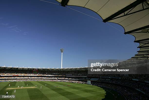 Packed house enjoys the action during day three of the first Ashes Test Match between Australia and England at The Gabba on November 25, 2006 in...