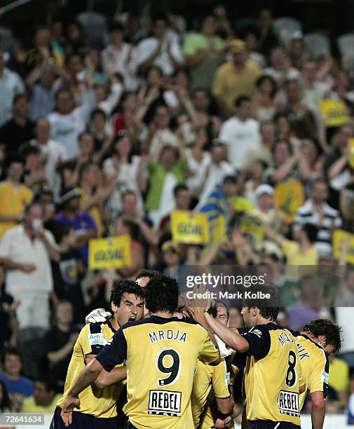 The Central Coast Mariners celebrate after scoring their second goal during the round fourteen Hyundai A-League match between the Central Coast...