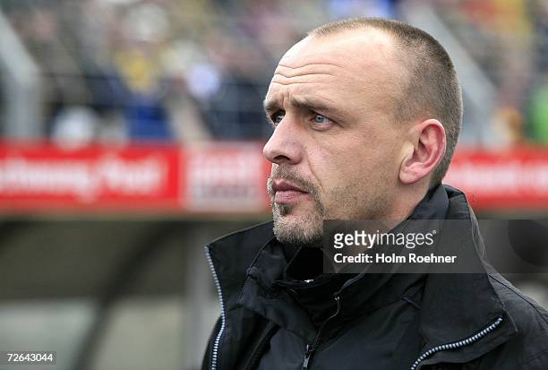 Holger Stanislawski, trainer of St. Pauli looks on during the Third League match between Dynamo Dresden and FC St.Pauli at the Rudolf-Harbig stadium...