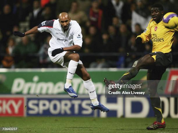 Nicolas Anelka of Bolton Wanderers scores the second goal during the Barclays Premiership match between Bolton Wanderers and Arsenal at the Reebok...