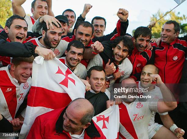 Georgia players celebrate after they drew 11-11 in the Rugby World Cup Qualifier against Portugal at the Estadio Universitario on November 25, 2006...