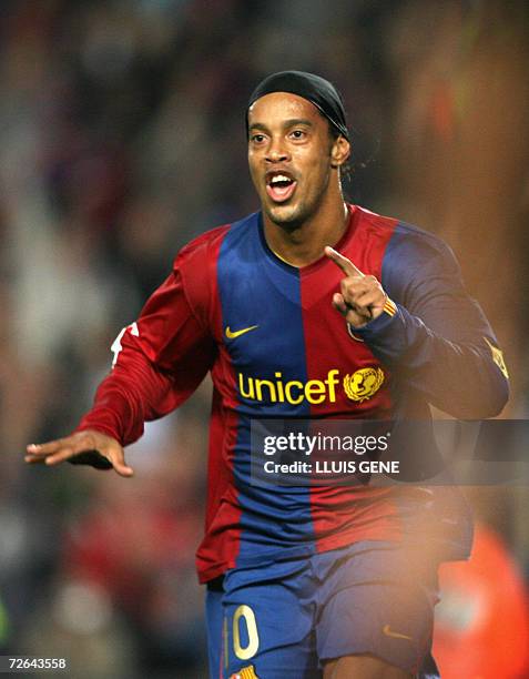 Barcelona's Brazilian Ronaldinho celebrates the first goal against Villarreal CF during their Spanish League football match at Camp Nou stadium in...