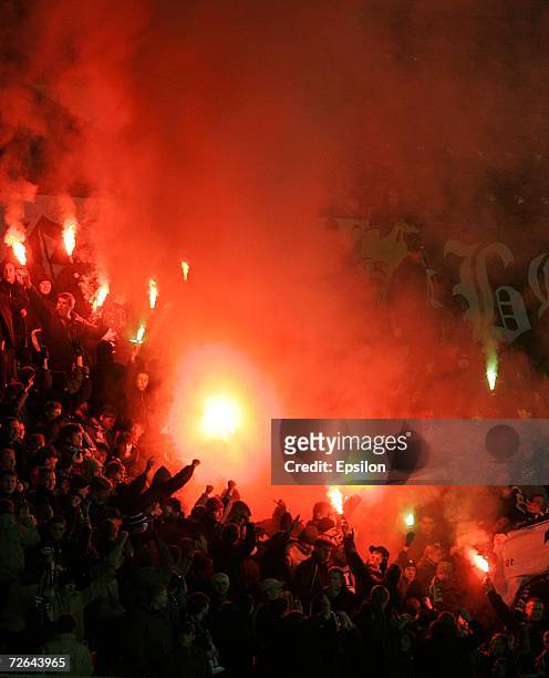 Fans light flares during the Football Russian League Championship match between FC Torpedo Moscow and FC Shinnik Yaroslavl on November 25, 2006 in...