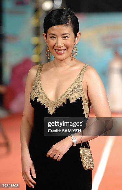 Hong Kong actress Sandra Ng poses while arriving the 43rd Golden Horse Film Awards in Taipei, 25 November 2006. The cream of Hong Kong cinema swept...