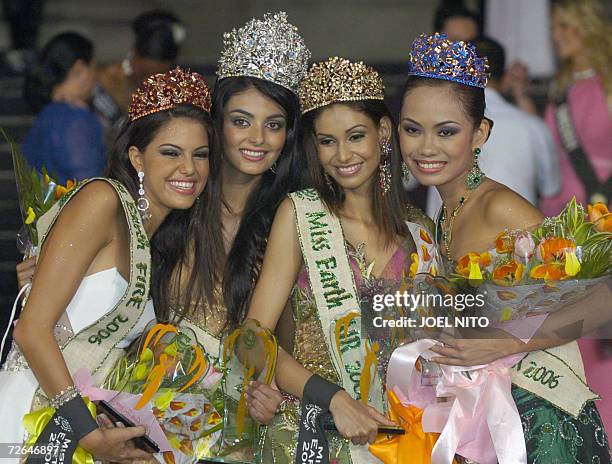 From left: Miss Venezuela Marianne Puglia Martinez who won the Miss Fire title, Miss Chile Hil Yesenia Hernandez Escobar the 2006 Miss Earth, Miss...