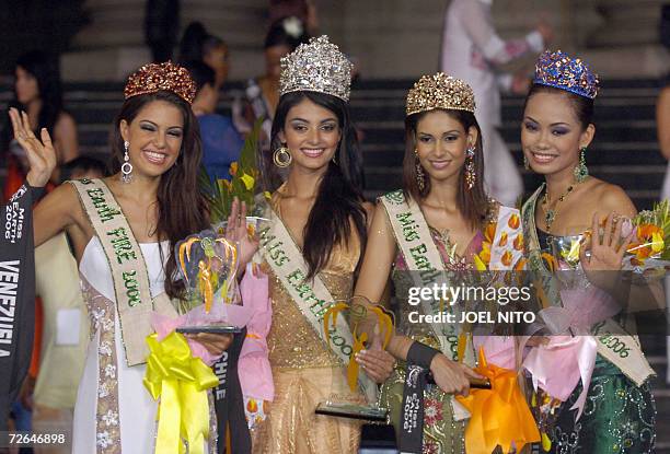From left: Miss Venezuela Marianne Puglia Martinez who won the Miss Fire title, Miss Chile Hil Yesenia Hernandez Escobar the 2006 Miss Earth, Miss...