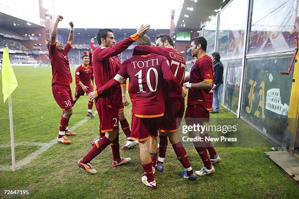 Roma players celebrate Francesco Totti's goal during the Serie A match between Sampdoria and Roma at Marassi stadium on November 26, 2006 in Genoa,...