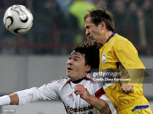 Dmitri Loskov of FC Lokomotiv Moscow competes for the ball with Andrei Bochkov of FC Rostov Rostov-on-Don during the Football Russian League...