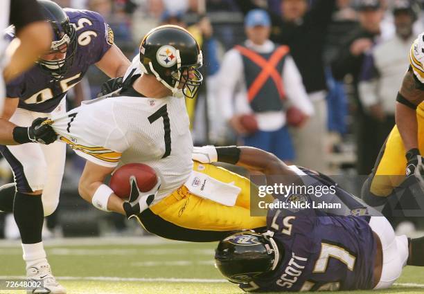 Ben Roethlisberger of the Pittsburgh Steelers is sacked by Jarret Johnson and Bart Scott of the Baltimore Ravens at M & T Bank Stadium November 26,...