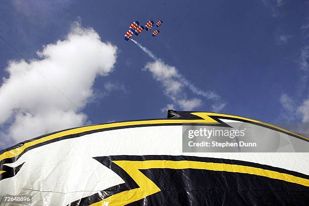 The British Royal Air Force skydivers jump into Qualcomm Stadium before the game between the San Diego Chargers and the Oakland Raiders on November...