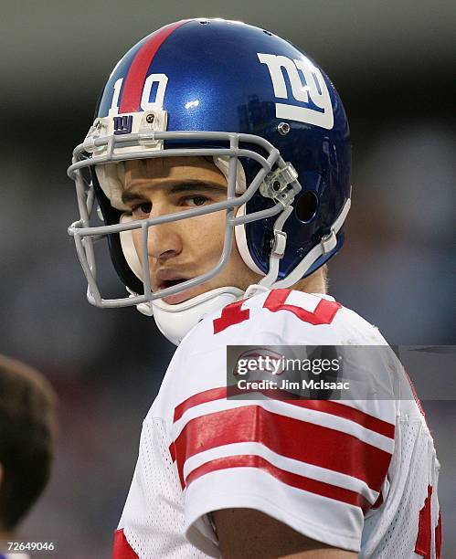 Eli Manning of the New York Giants looks on against the Tennessee Titans during their game on November 26, 2006 at LP Field in Nashville, Tennessee....