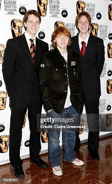 Actors Rupert Grint and James and Oliver Phelps arrive at the 11th British Academy Children's Film & Television Awards at the Park Lane Hilton hotel...