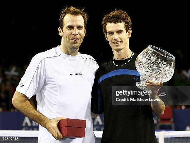 Greg rusedski of england and andy murray of scotland pose together after the aberdeen tennis Greg rusedski of england and andy murray of scotland pose together after the aberdeen tennis