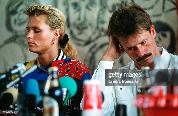 Katrin Krabbe and Coach Thomas Springstein are seen during the press conference on June 13, 1992 in Neubrandenburg, Germany.