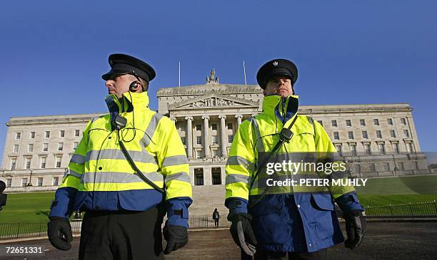 United Kingdom: Two security guards stand outside the Stormont Parliament building in Belfast, in Northern Ireland, 27 November 2006. Northern...